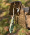 Dipper holder with magnets