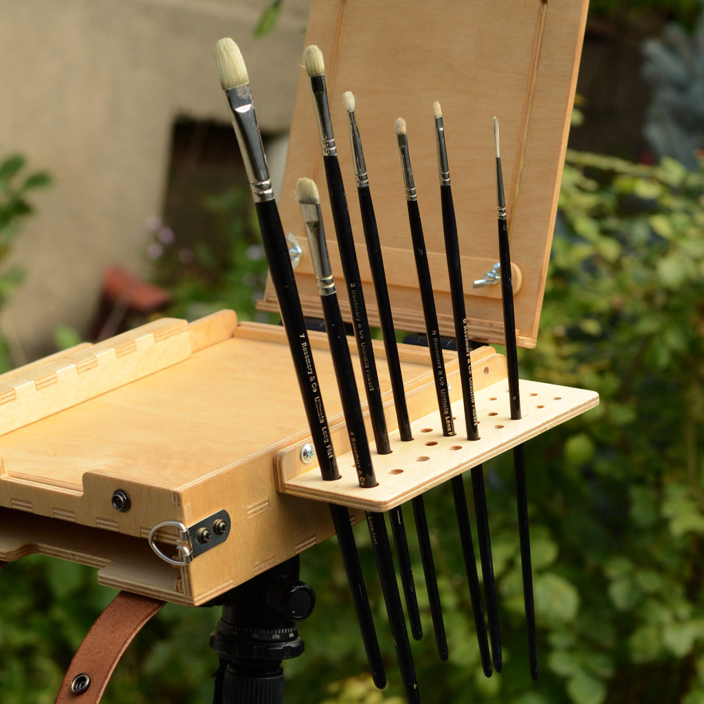 Side brush holder with holes